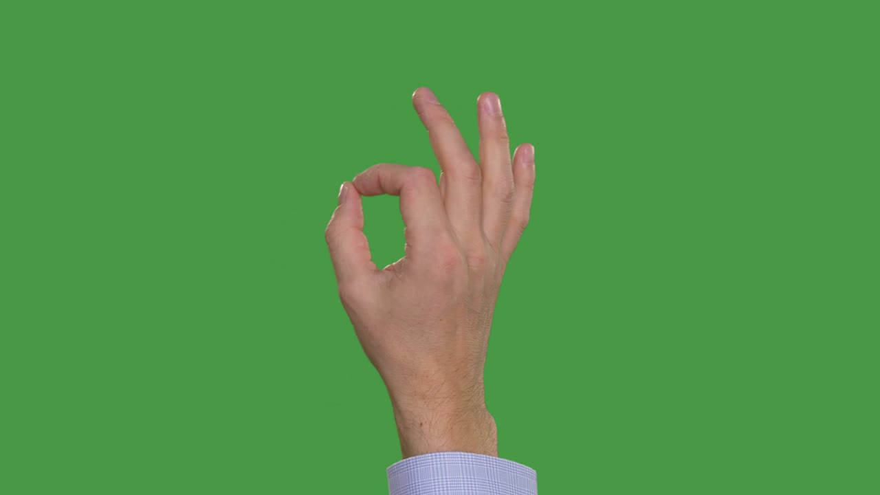 Partial view of male hand showing okey symbol gestures. Alpha channel