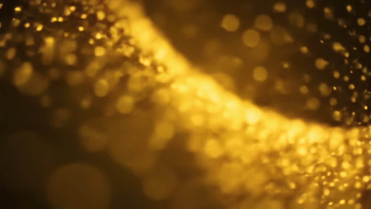Golden sparkles dance and swirl in varied patterns, creating a stunning display. This artistic exploration captures the beauty of light and motion during an enchanting night setting.