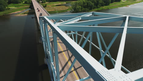 Flight-reveal-of-Wabasha–Nelson-Truss-Bridge-In-Wabasha,-MN,-United-States---rearward-aerial-dolly-shot