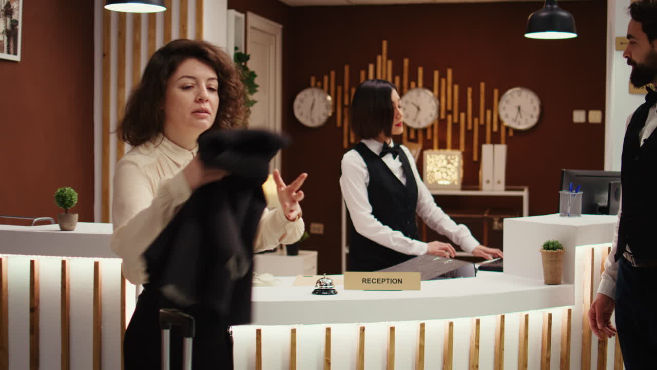 Businesswoman waiting for hotel room