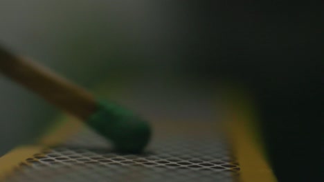 lighting a match in slow motion.