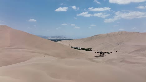 dune buggies in huacachina, peru desert