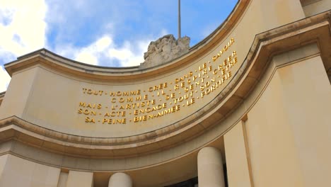 Looking-Up-Into-Left-Wing-Facade-With-Writing-At-Place-du-Trocadero,-Paris,-France