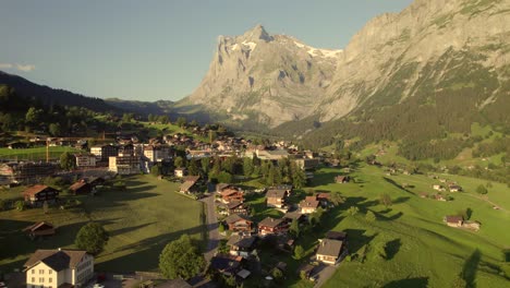 rising-up-over-Endweg-revealing-stunning-view-of-Grindelwald-village-and-mount-Wetterhorn