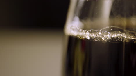 Close-up-rack-focus-to-bubbles-inside-of-a-coffee-pot