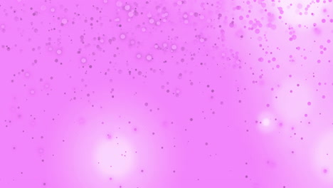 animación de múltiples manchas rosadas brillantes de luz que se mueven en movimiento hipnótico sobre un fondo rosado