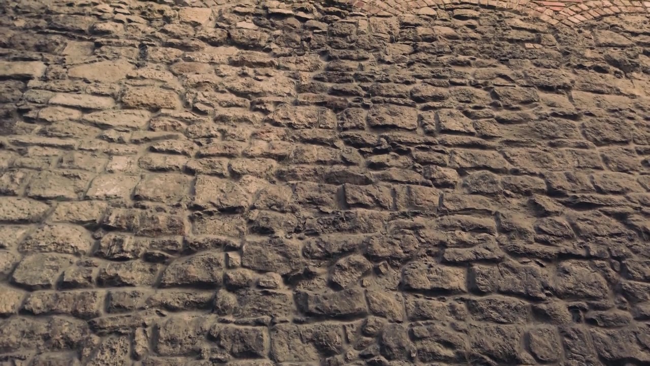 Antico muro medievale in pietra. Un elemento di architettura antica.