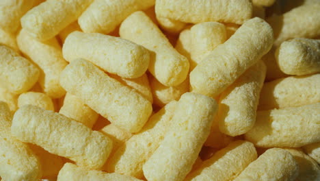 background of light snacks - corn sticks