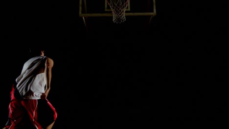 male basketball player playing in the court 4k