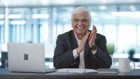 happy senior indian businessman clapping and appreciating