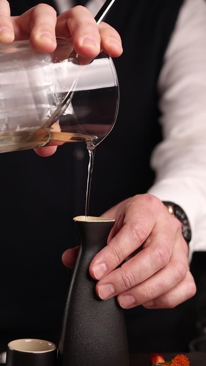 Bartender Pouring Sake