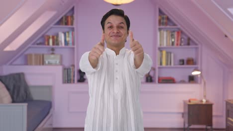 Happy-Indian-man-showing-thumbs-up