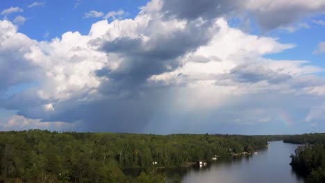 aerial shot following a weather system hovering over the canadian whiteshell