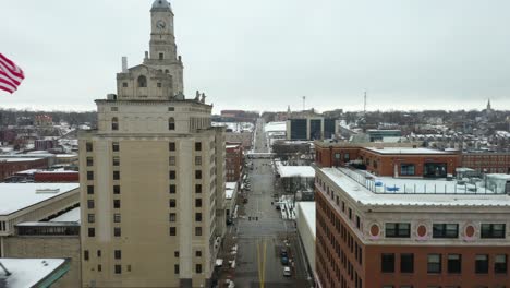 drone flies backwards to down main street in davenport, iowa