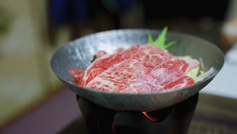japanese marbled wagyu beef in sukiyaki pot