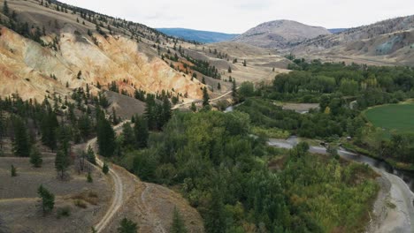 Slow-aerial-flyover-Cahache-Creek,-Canada