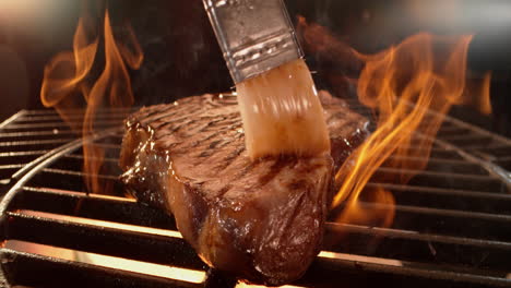 grilled steak being prepared on a barbecue grill