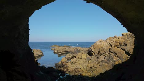 coastal cave with sea view on the coast of caion in coruna, spain