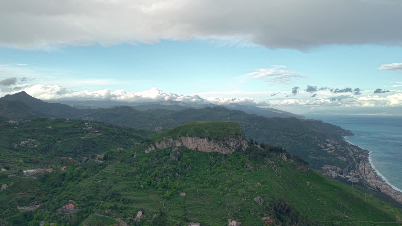 Scenic aerial view of Castelmola village and coast, Sicily, tranquil and vast