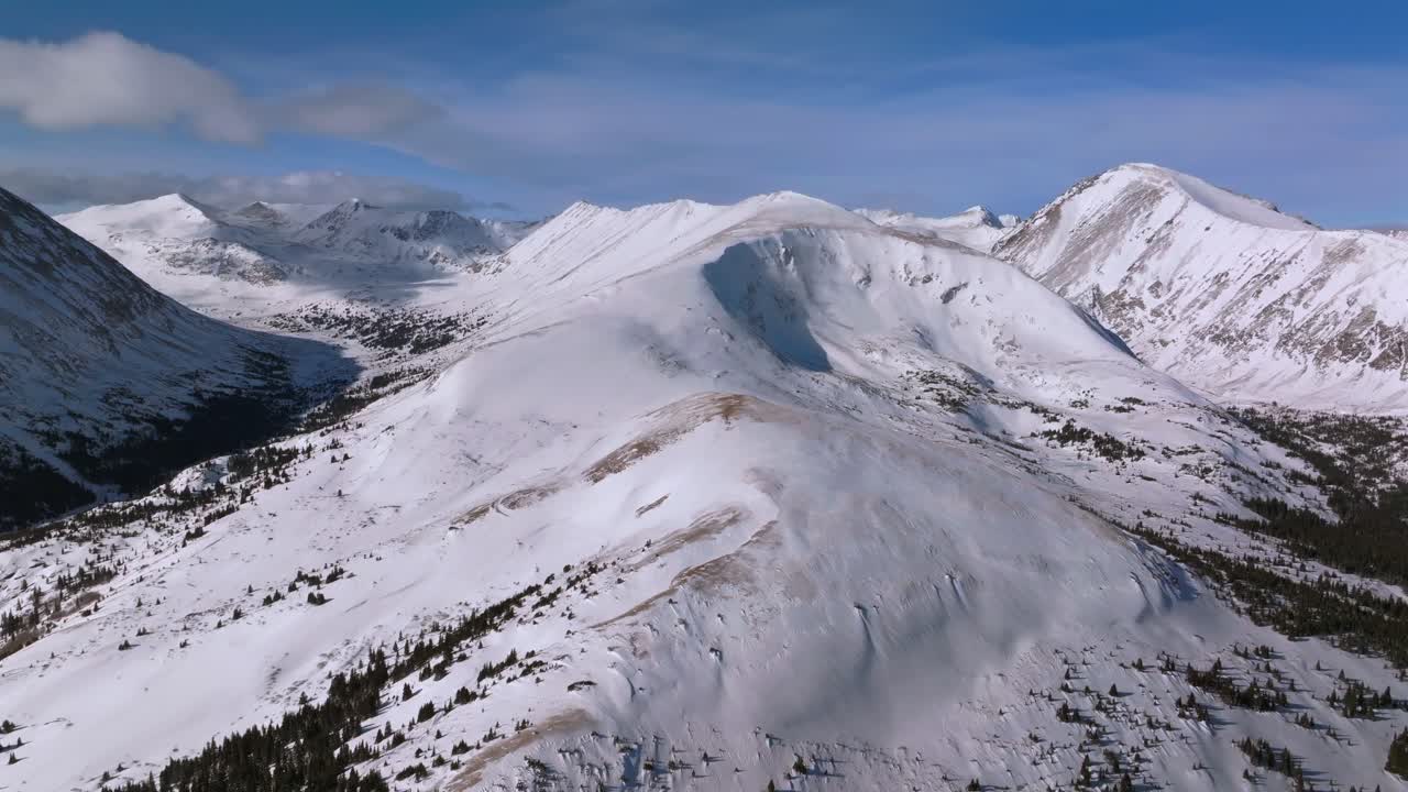 Quandary Peak Hoosier Pass Breckenridge Colorado aerial drone winter wilderness high alpine treeline Alma Fairplay Blue River Rocky Mountains morning blue sky 14er December January upwards motion