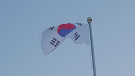 south korean national flag waving in the wind windy time in the blue sky