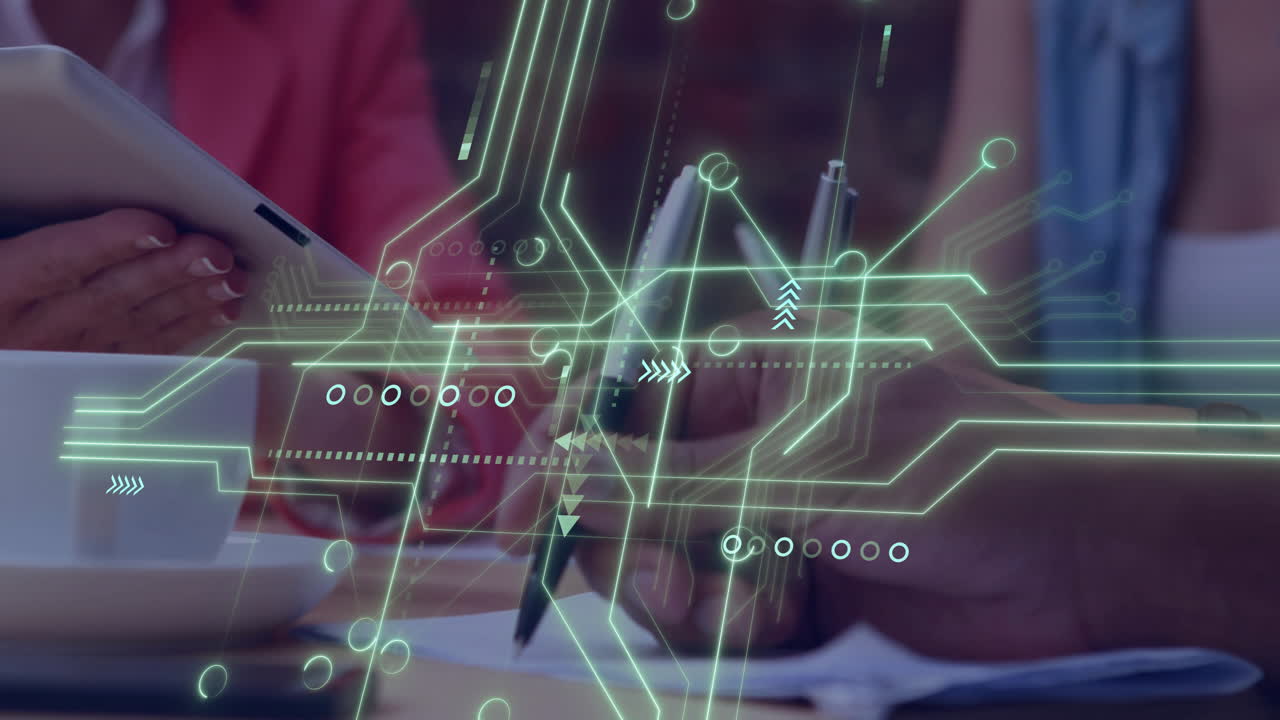 Hands interacting with tablet and pen under neon circuit overlay, illustrating digital teamwork