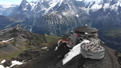 aerial: mountain station close to jungfrau, eiger and monch