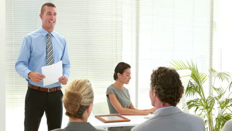 Business-people-listening-during-conference-