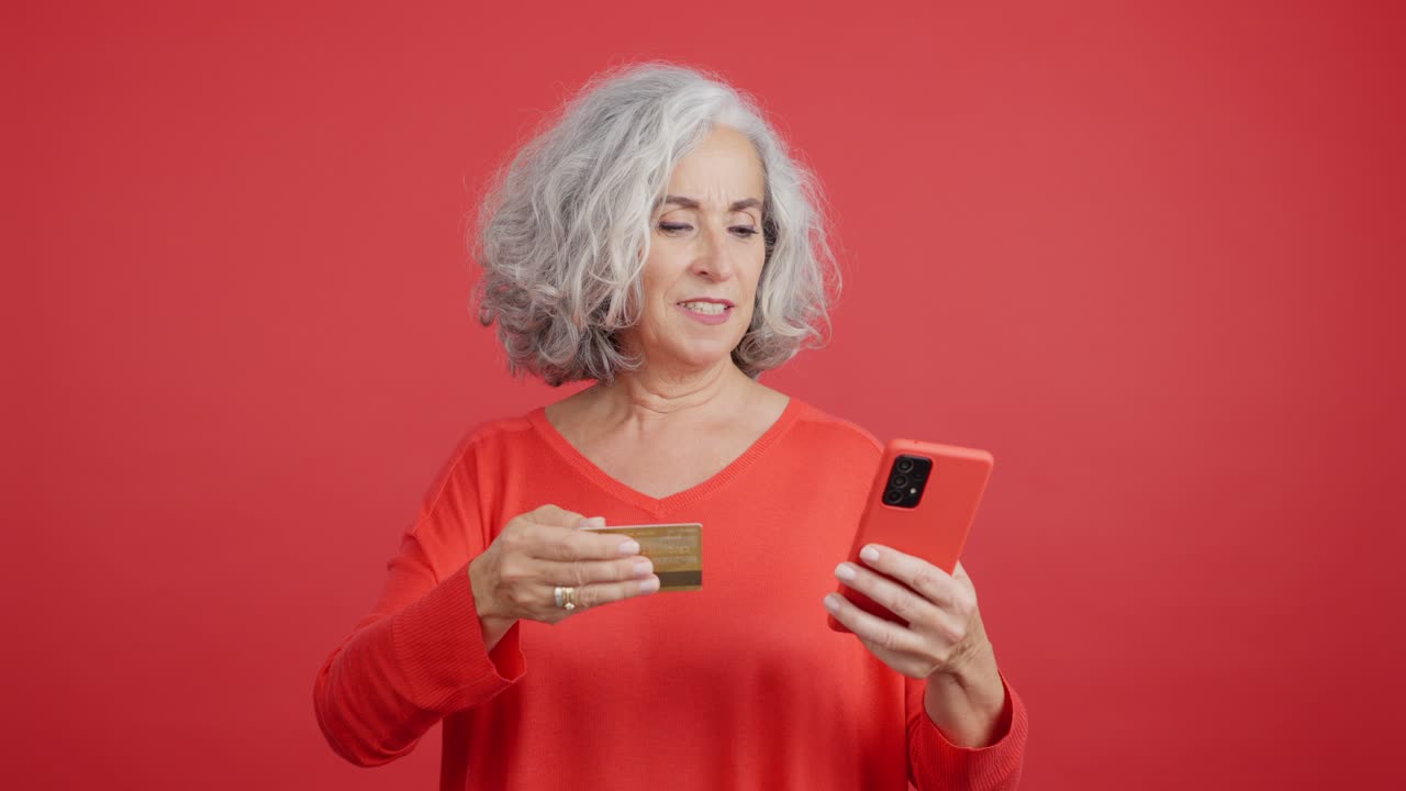 Senior Woman Shopping Online with Credit Card