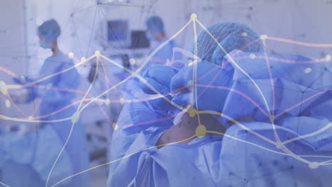 healthcare professionals in protective gear with data network animation overlay