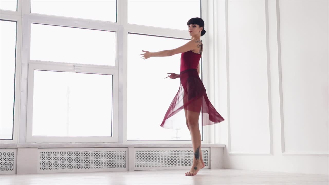 Ballet Dancer in Red Leotard