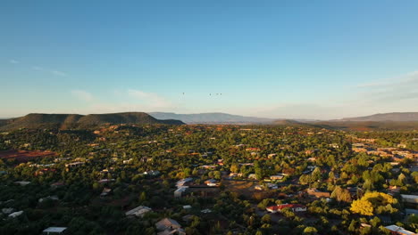 Cinematic-slow-rotating-drone-shot-of-Sedona-Arizona-with-blue-skies