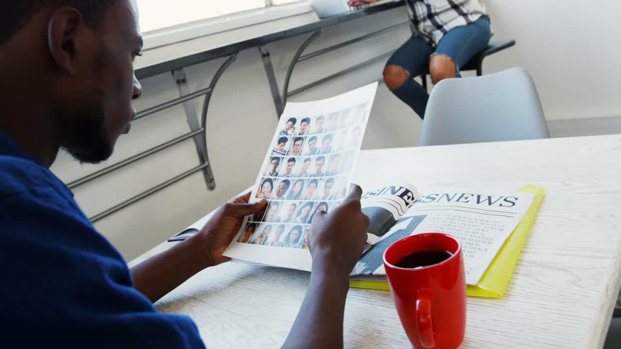 Male executive looking at documents