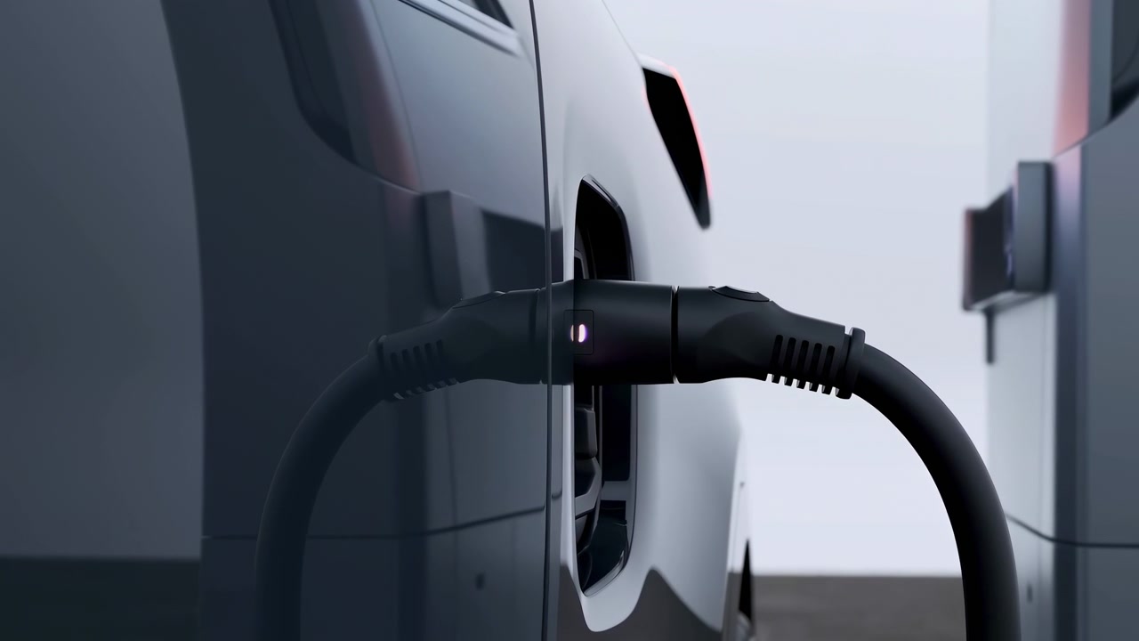 Electric Vehicle Charging At Station, Closeup Of Sleek Gray Car Plugged Into Fast Charger, Thick Black Cable