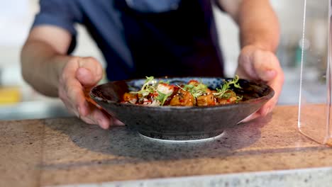 chef serving a delicious dish