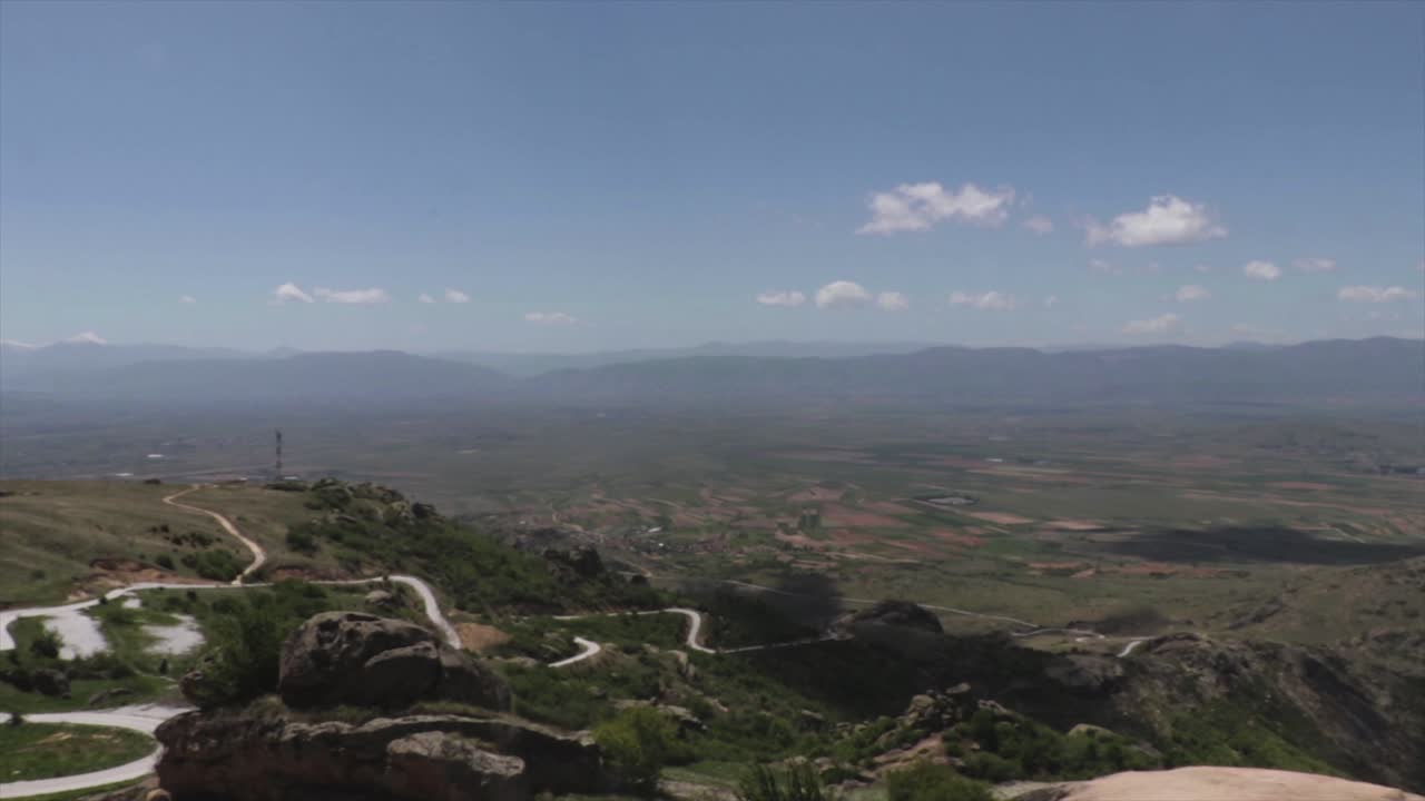 Landscape of field and mountains. Sightseeing. Hiking trip
