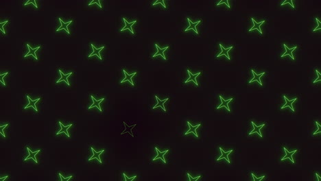 estrellas de neón verde en filas en degradado negro
