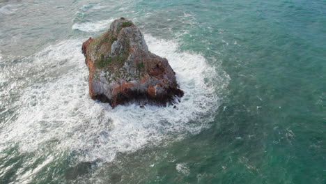 scoglio il morto, sardinia, iglesias: fantastic view approaching the famous islet on the island of sardinia