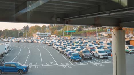 vehicles waiting to drive on to a ferry