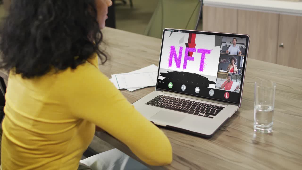 African american businesswoman using laptop for video call with diverse business colleagues
