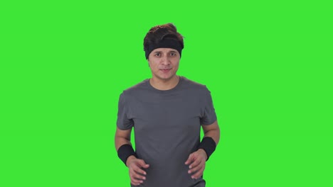 Happy-Indian-man-doing-jogging-Green-screen