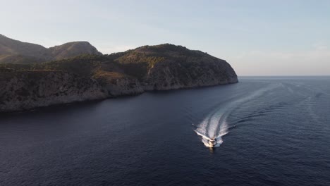 Motor-Boat-near-Cliffs-of-Mallorca-Island,-Spain