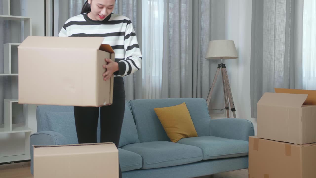 Woman Moving into a new Apartment