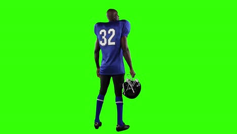 american football player on green screen background.