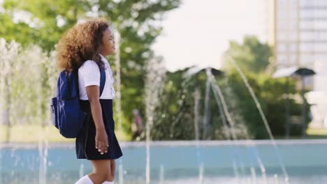 schoolgirl walking to school