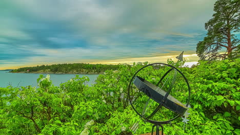 pan shot of an island in distance in sorento, italy from capri on a cloudy day