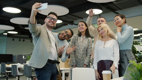 team selfie in modern office