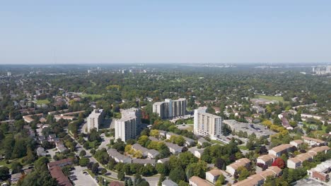 Drone-flying-over-a-sunny-and-hazy-summer-day-in-a-London-suburb