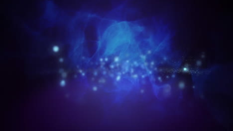 animación de manchas flotando sobre un fondo azul brillante