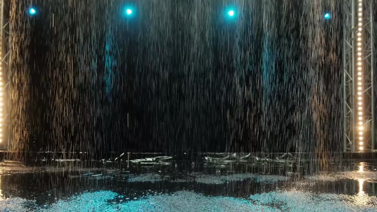 스포트라이트의 배경에 대한 아쿠아 스튜디오의 비의 효과, 물의 질감, 느린 동작